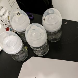 4 Avent glass bottles